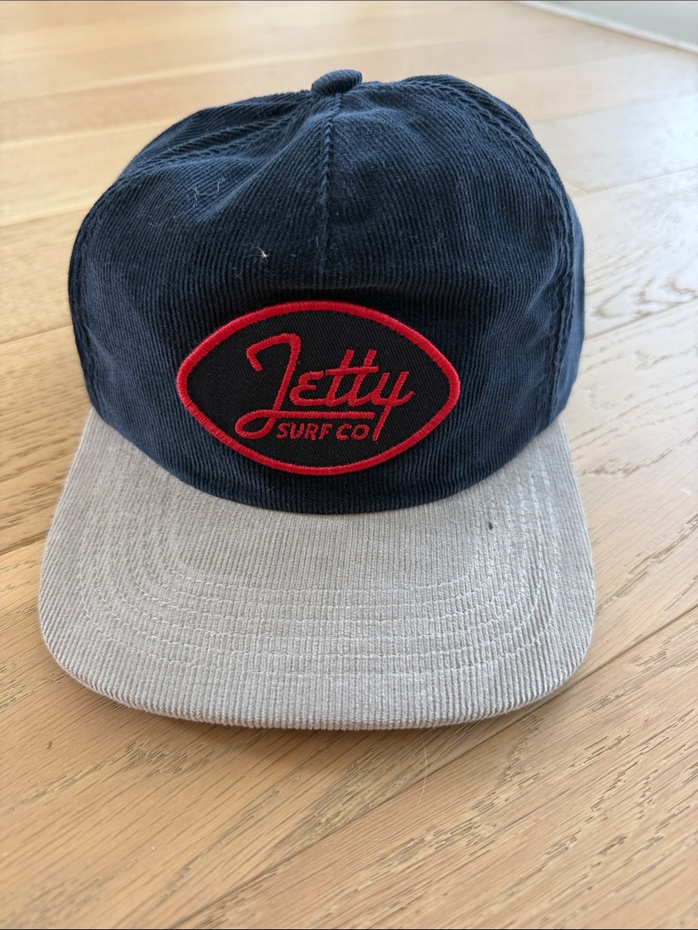 Jetty Surf Co. Navy and Gray Corduroy Snapback Hat with Red Logo